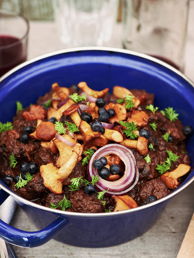 Beef Goulash With Blueberries And Chanterelle Mushrooms Photograph by Hannah Kompanik