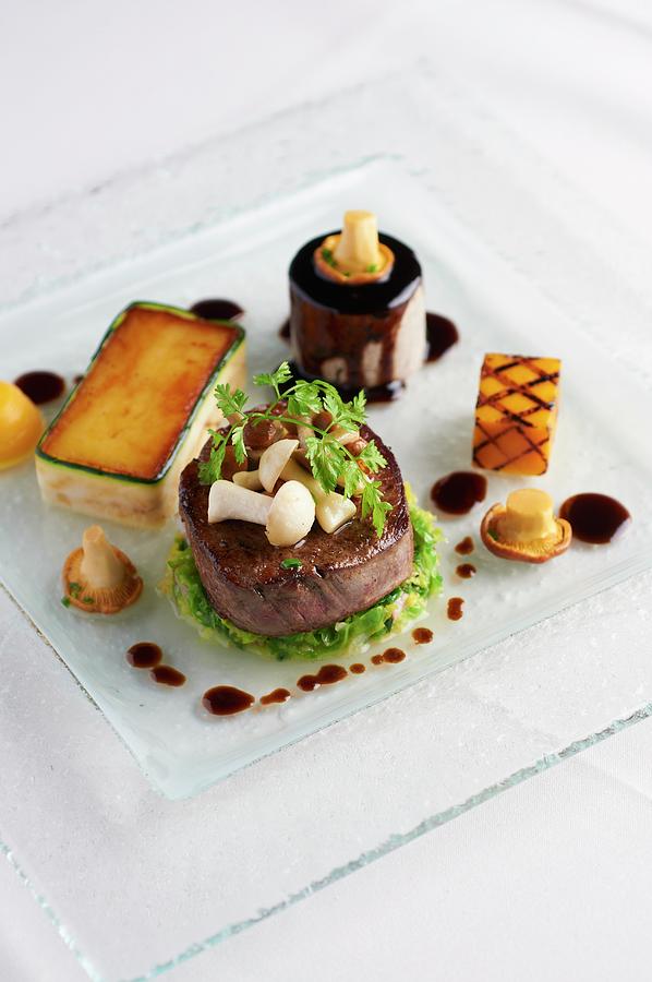 Beef Medallion With Mushrooms And Chervil Photograph by Tim Green