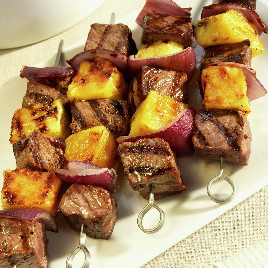 Beef, Red Onion And Pineapple Shish Kabobs Photograph by Paul Poplis