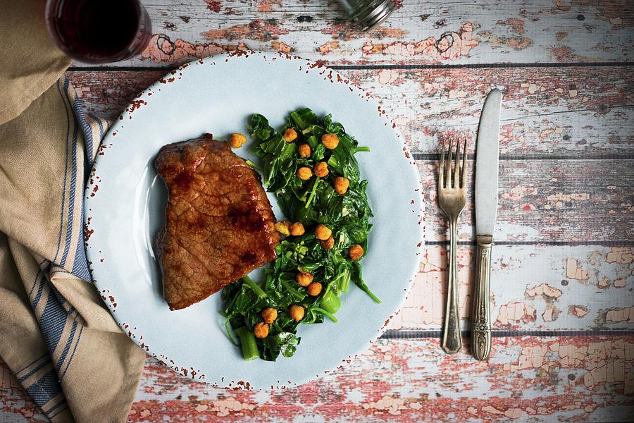 Beef Steak With A Chickpea And Spinach Medley Photograph by Alena Haurylik