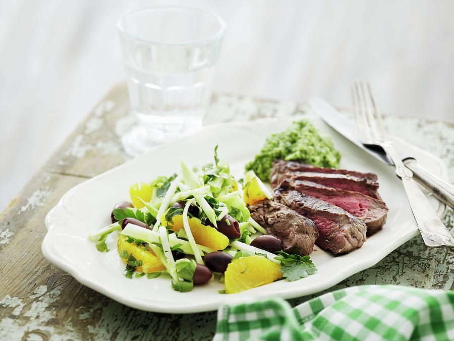 Beef Steak With Broccoli Purée And A Salad With Orange Fillets ...