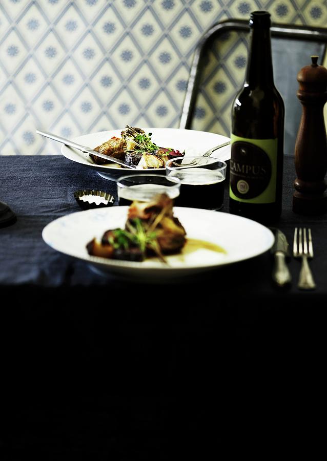 Beef Steak With Oven-roasted Vegetables And Dark Beer Photograph by Mikkel Adsbl