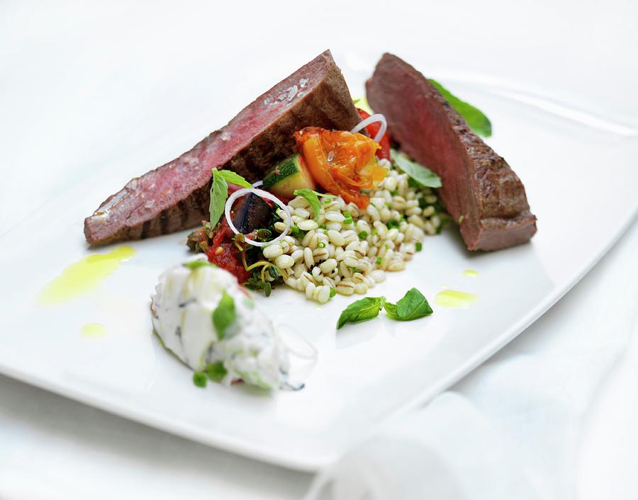 Beef Steak With Pearl Barley And Vegetables Photograph by Martin Dyrlv