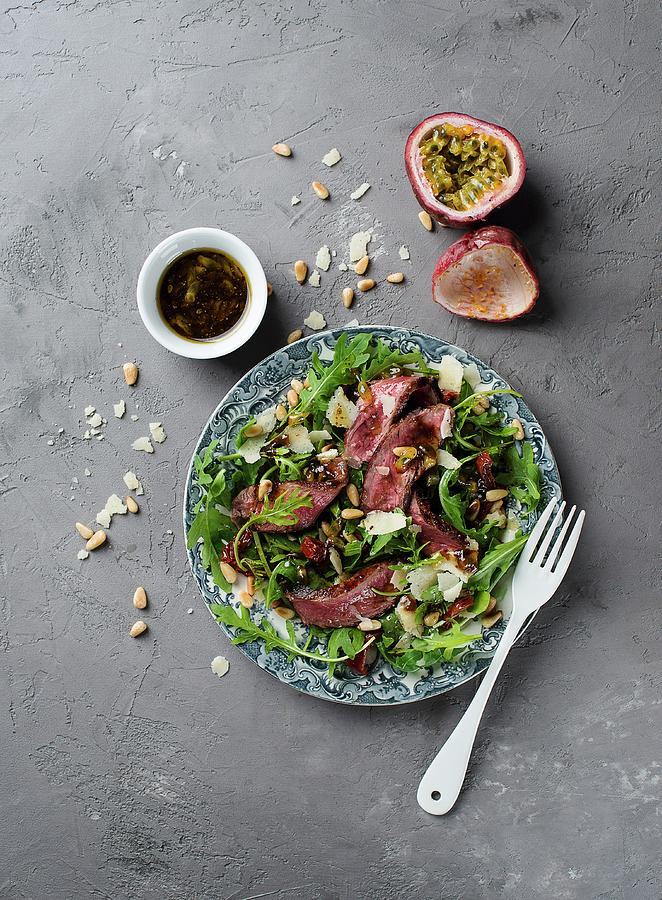 Beef Steak With Rocket, Dried Tomatoes And Passionfruit & Balsamic Vinegar Dressing Photograph by Ewgenija Schall