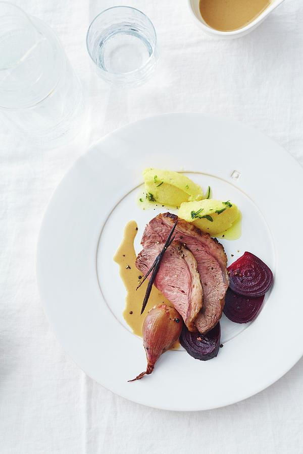 Beef Stew With Polenta Dumplings And Beetroot Photograph by Jalag