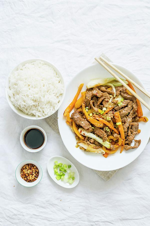 Beef Stir Fry With Carrot And Spring Onion Served With Rice china Photograph by Maricruz Avalos Flores