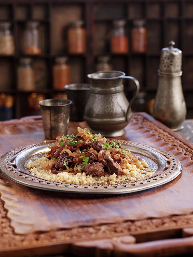 Beef Tagine On A Bed Of Couscous north Africa Photograph by Ian Garlick