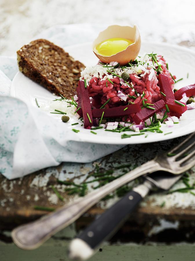 Beef Tatar With Beetroot, Egg And Wholemeal Bread Photograph by Mikkel Adsbl