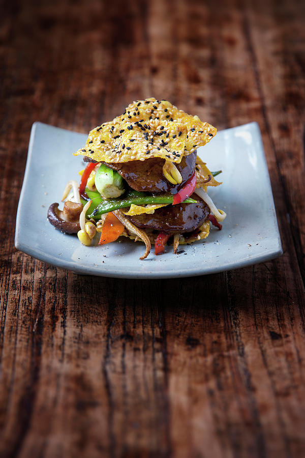 Beef Teriyaki With Stir-fried Vegetables And Sesame Seed Crisps Photograph by Michael Wissing