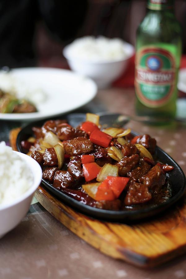Beef With Peppers And Onions In A Restaurant china Photograph by Eva Lambooij
