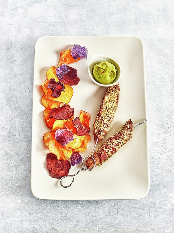 Beef With Quinoa And Colourful Vegetable Crisps Photograph by Frdric Perrin