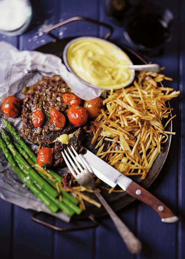 Beefsteak With Bearnaise Sauce, Green Asparagus And Potatoes Straw Photograph by Great Stock!