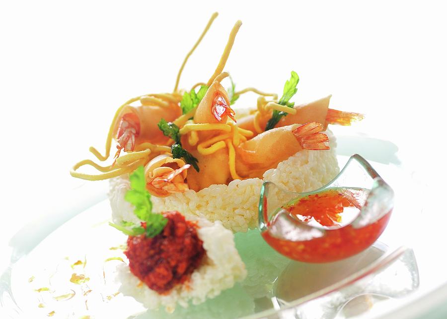 Beer-battered Prawns With A Sweet And Sour Dip In A Rice Nest Photograph by Kaktusfactory