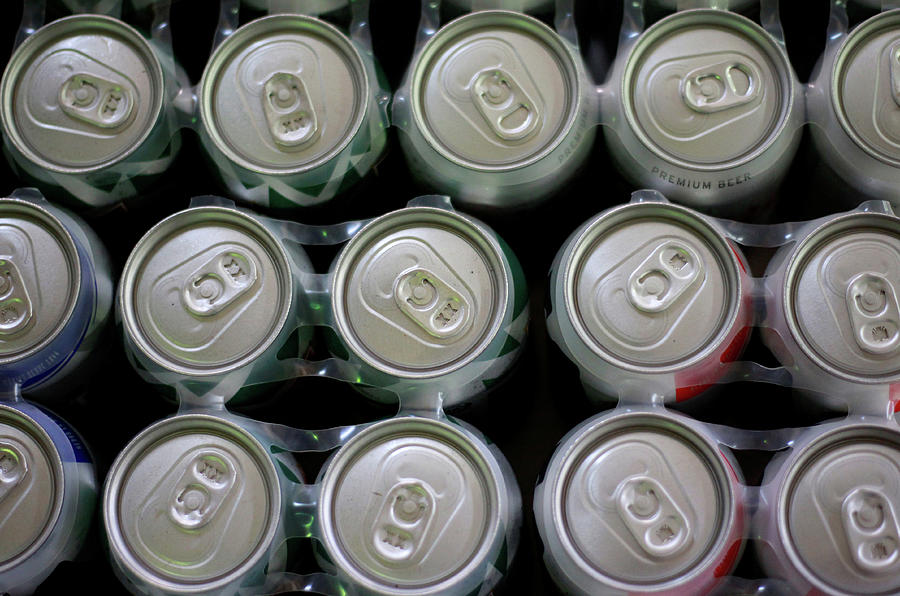 Beer Cans Are Displayed in a Store Photograph by Jose Luis Gonzalez ...