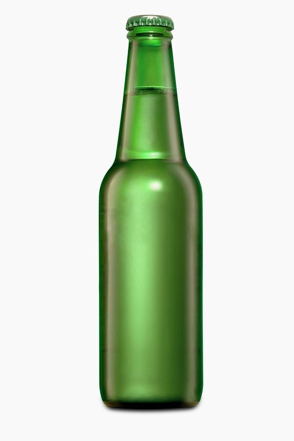 Beer In A Green Bottle On A White Background Photograph by Cooke, Colin