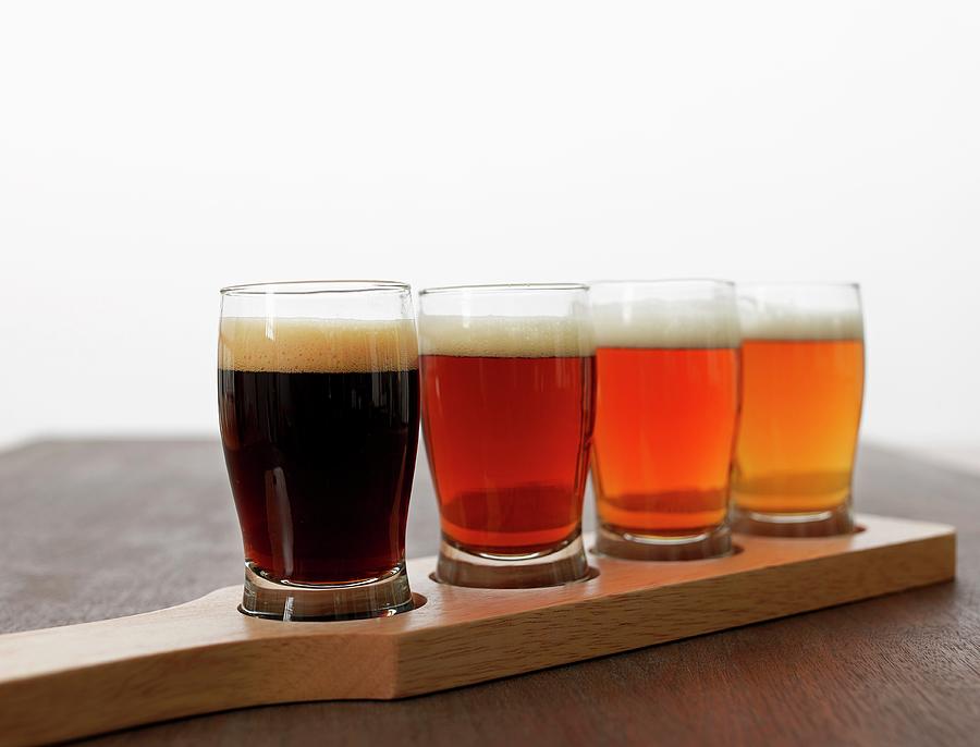 Beer In An Assortment Of Glasses Photograph by Kurt Wilson