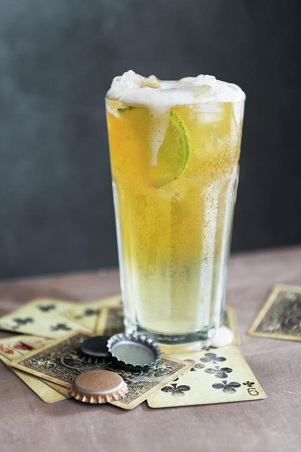 Beer Lemonade With A Slice Of Lemon Photograph by Veronika Studer