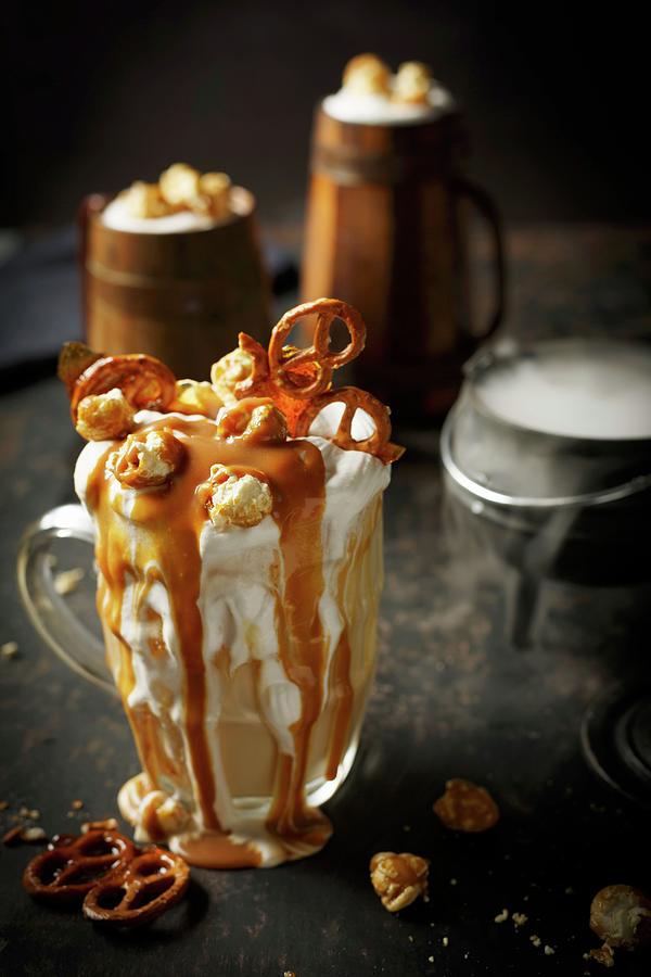 Beer Milkshake With Caramel Sauce, Pretzels And Popcorn For Halloween ...