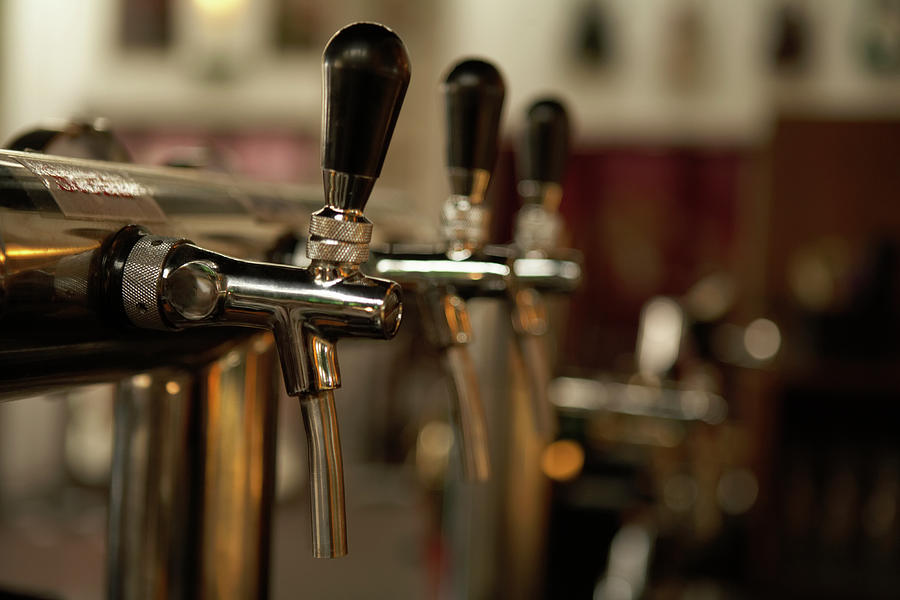 Beer Taps At A Bar Photograph by Blue Jean Images