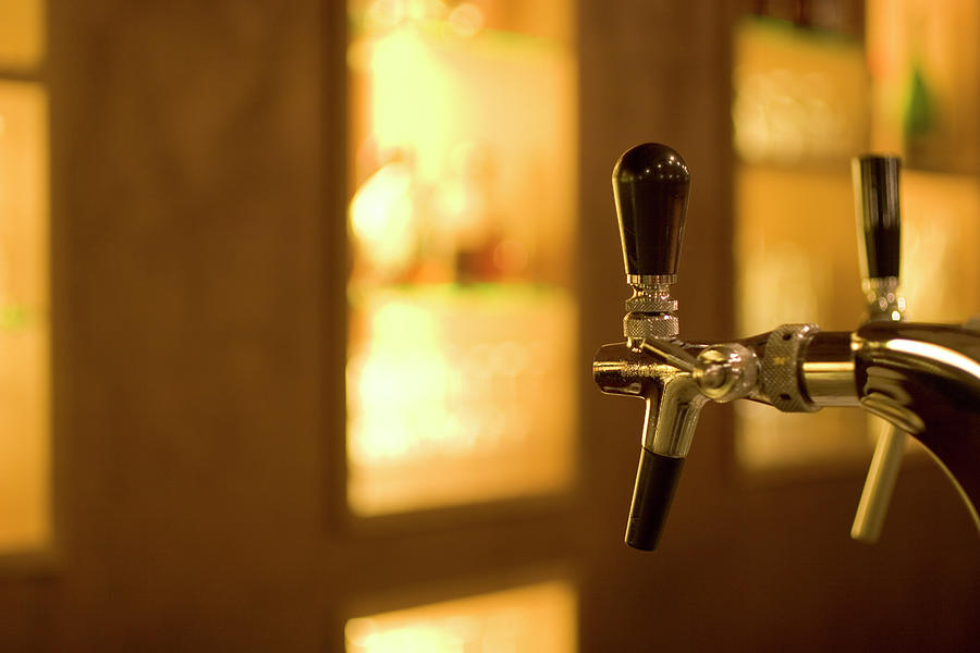 Beer-taps In A Bar Photograph by Kohlerphoto