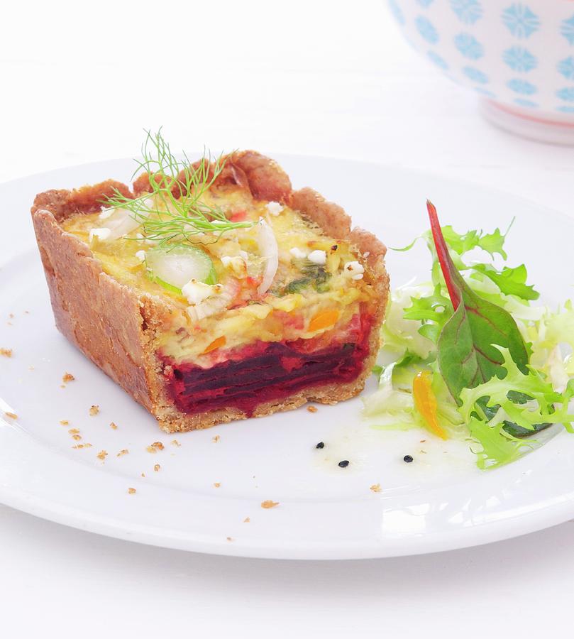 Beetroot And Fennel Quiche With Lettuce Photograph by Udo Einenkel