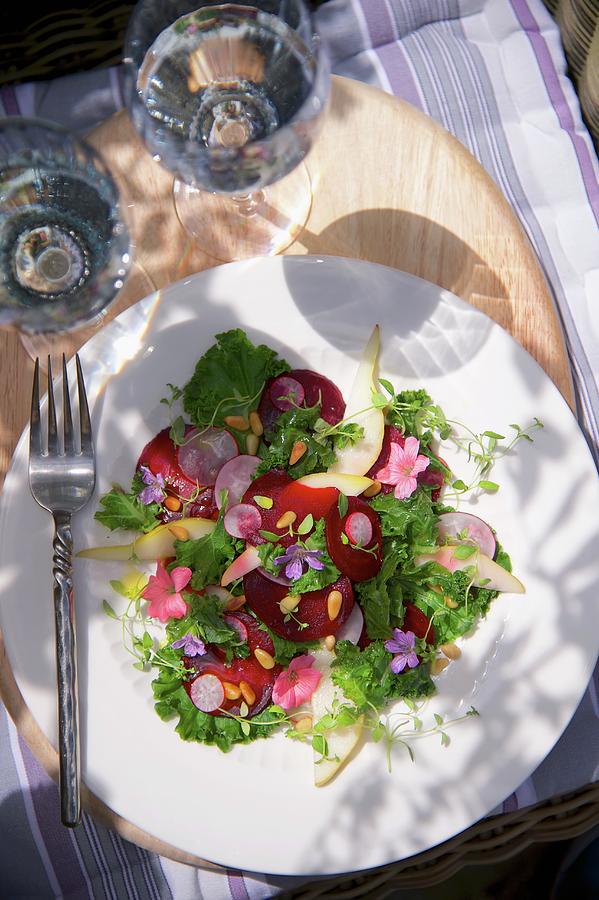 Beetroot And Green Kale Salad With Radishes, Pears And Flowers Photograph by Winfried Heinze