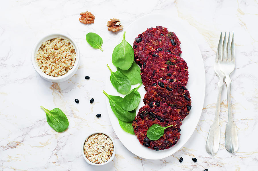 Beetroot And Quinoa Patties With Black Beans, Walnuts And Spinach Photograph by Natasha Arz
