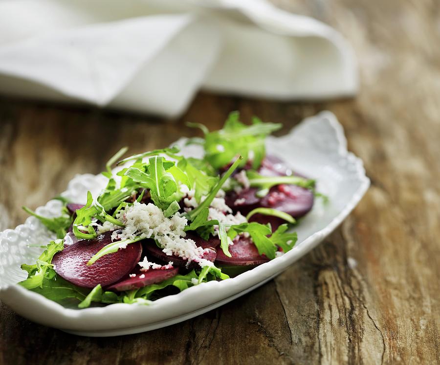 Beetroot Carpaccio With Rocket And Horseradish Photograph by Mikkel Adsbl
