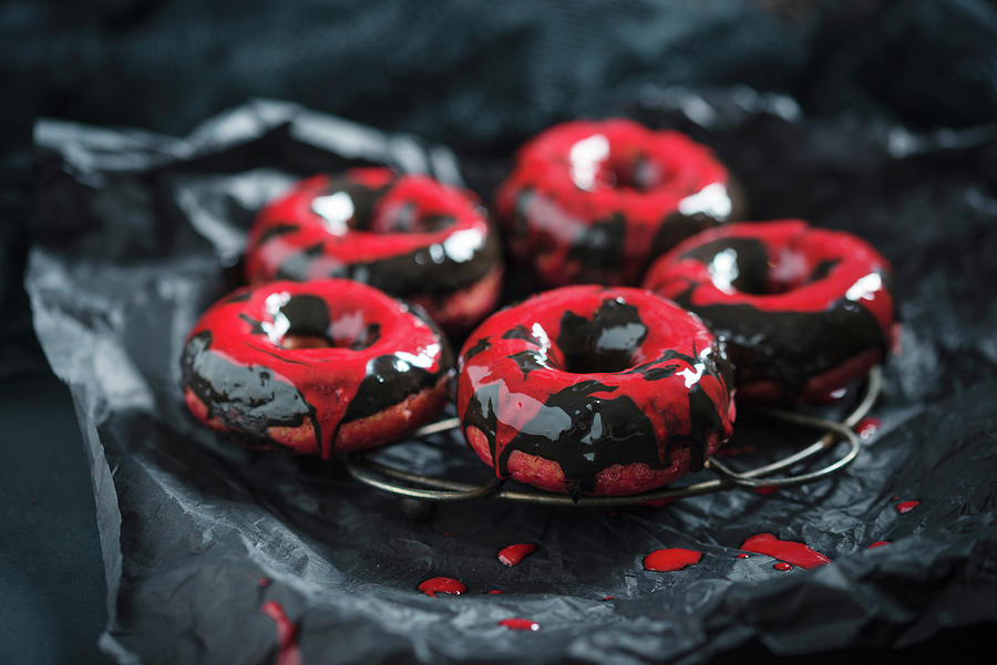 Beetroot Donuts With Two-tone Chocolate Icing For Halloween Photograph by Kati Neudert
