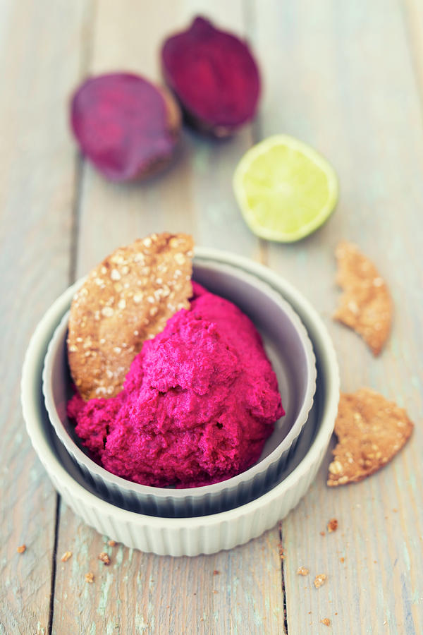 Beetroot Hummus With Lime Served With Crispbread Photograph by Jan Wischnewski