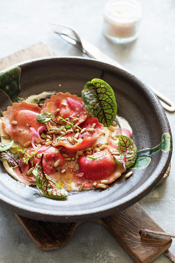 Beetroot Ravioli With Herbs And Sunflower Seeds Photograph by Lilia Jankowska