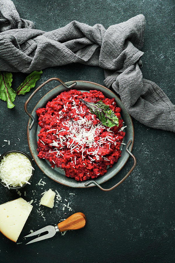 Beetroot Risotto With Hard Cheese And Caramelized Leaves Photograph by Julia Bogdanova