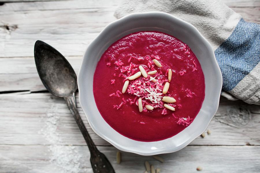 Beetroot Soup With Pine Nuts And Horseradish Photograph by Carolina Auer Photography