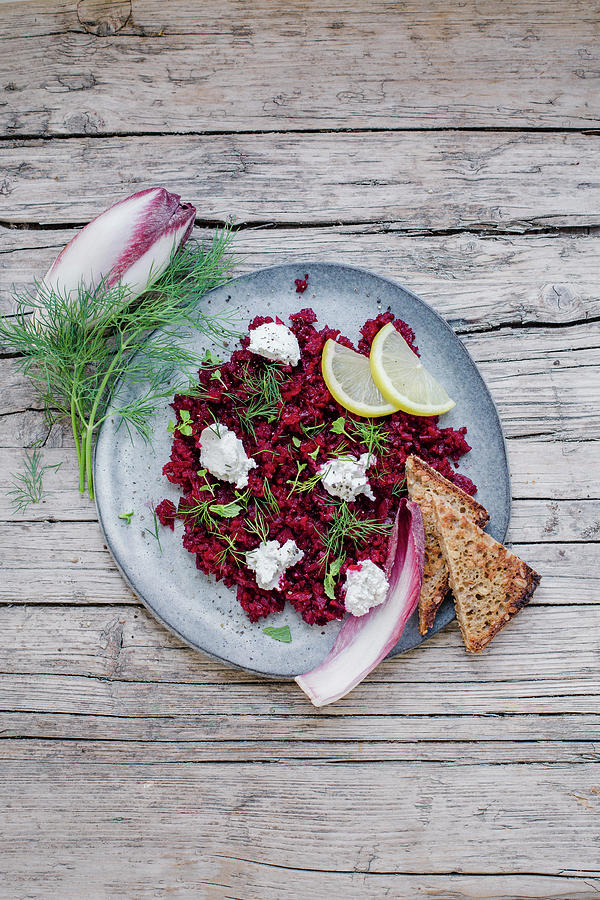 Beetroot Tartare With Purple Chicory, Dill, Cream Cheese And Grilled Bread Photograph by Tina Engel