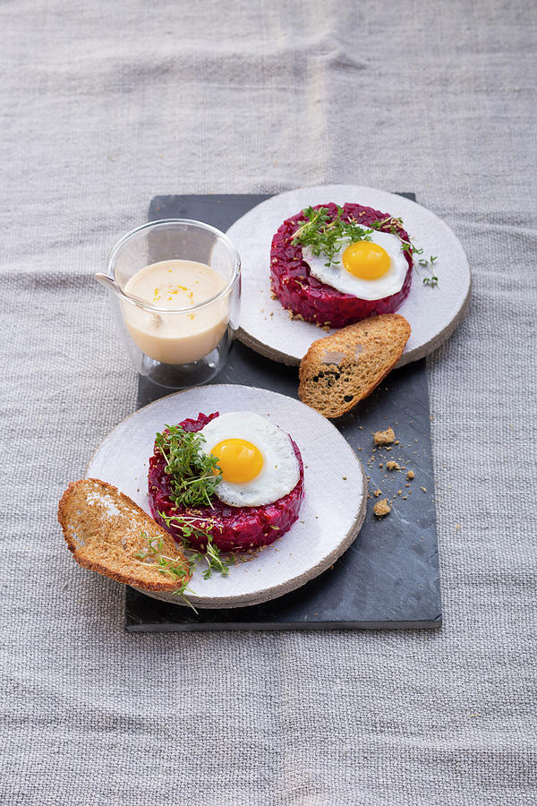 Beetroot Tatar With Quail Eggs, Bread Crisps And Hollandaise Sauce Photograph by Eising Studio