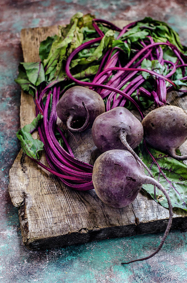 Beetroots On A Wooden Board Photograph by Gorobina