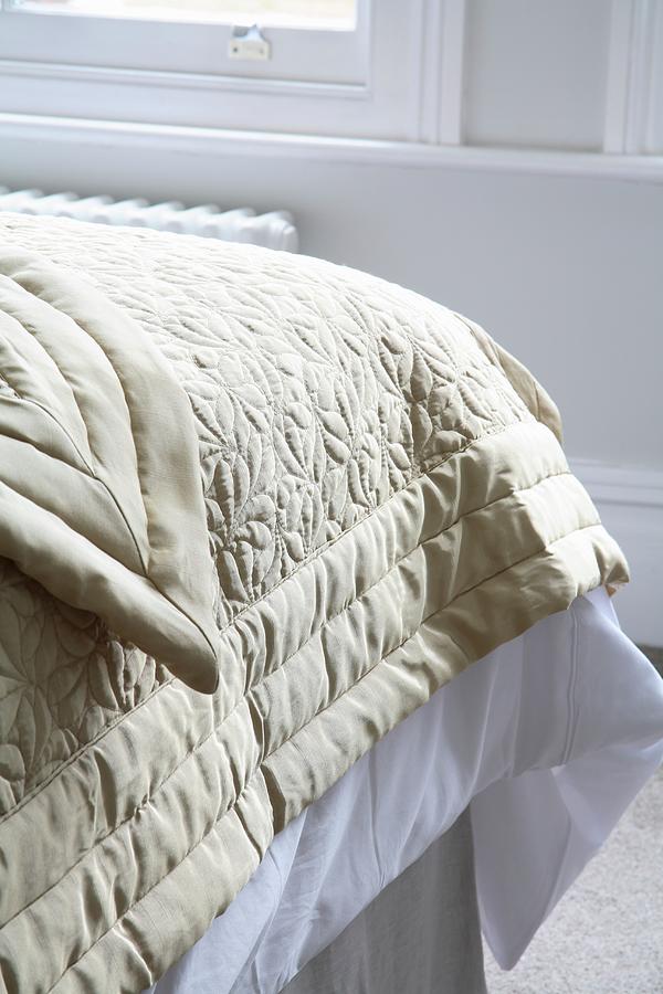 Beige Quilt On Bed Photograph by Simon Scarboro - Fine Art America