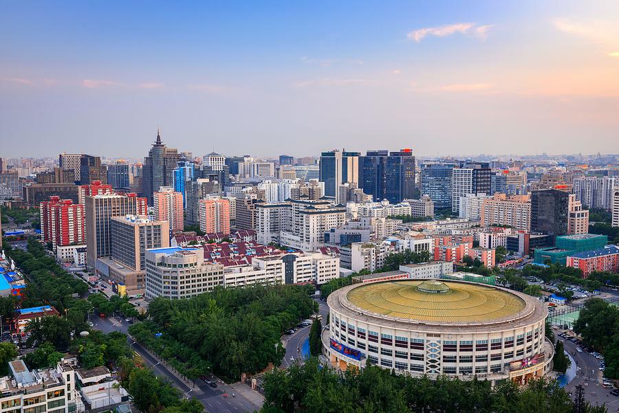 Architecture Photograph - Beijing, China Cityscape And Arena by Sean Pavone