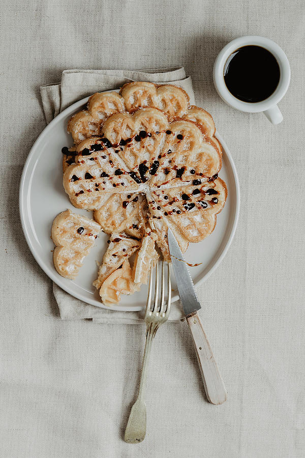 Belgian Waffles With Chocolate Sauce For Serving With Coffee top View Photograph by Valeria Aksakova