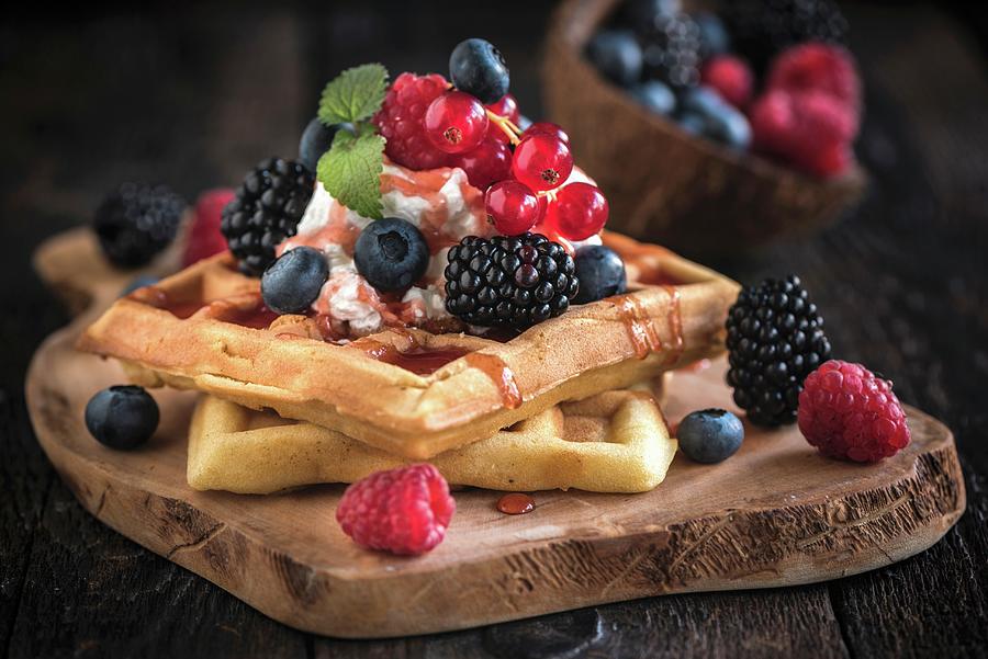 Belgian Waffles With Ice Cream And Berries On A Wooden Board Photograph By Ltummy Fine Art America