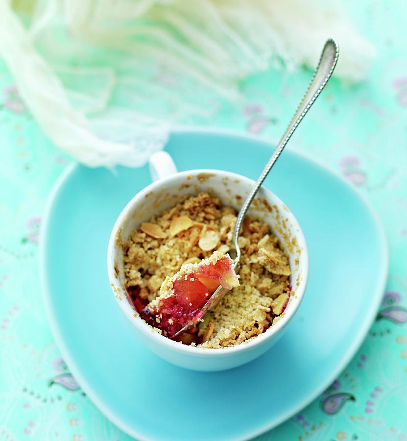 Berry Crumble With Almonds Photograph by Lars Ranek