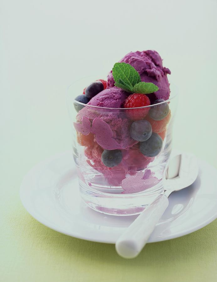 Berry Ice Cream With Fresh Blueberries And Raspberries In A Dessert Glass Photograph by Jonathan Gregson