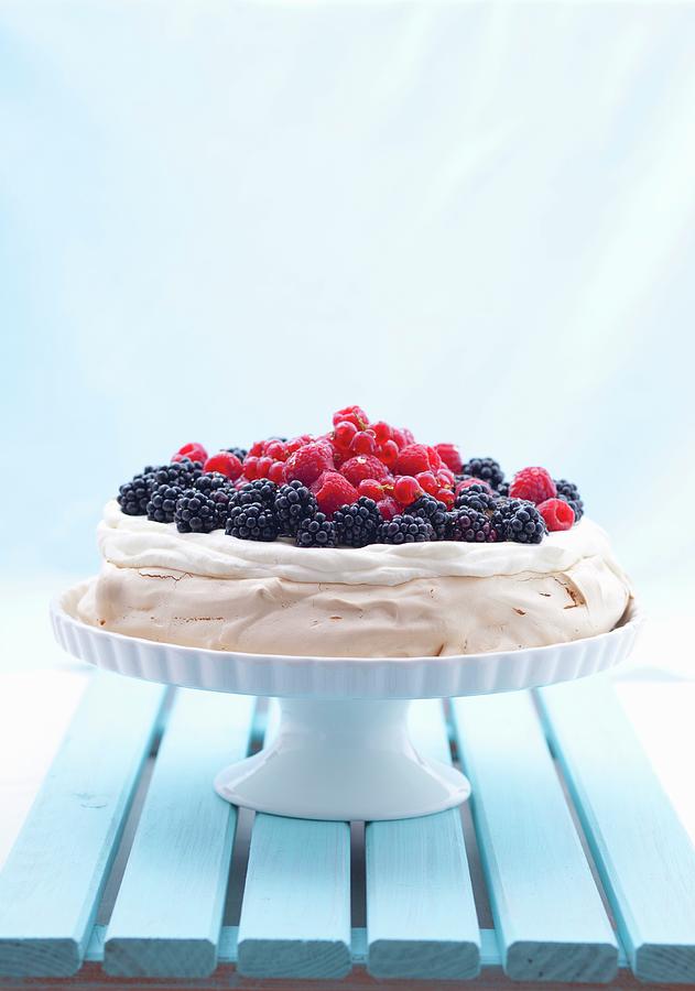 Berry Pavlova On A Cake Stand Photograph by Studio Lipov