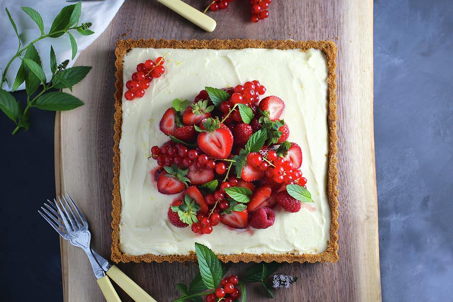Berry Tart With Lemon Cream Photograph by Emily Clifton