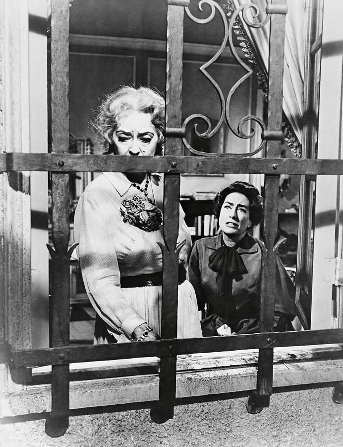 BETTE DAVIS and JOAN CRAWFORD in WHAT EVER HAPPENED TO BABY JANE? -1962-. Photograph by Album