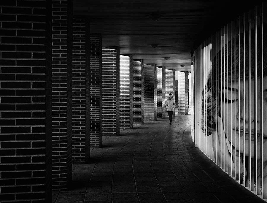 Black And White Photograph - Between Columns by Adolfo Urrutia