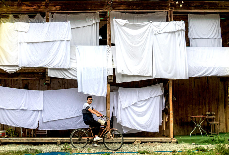 Bicycle And Landry Sheets Photograph by Ali Abu Ras