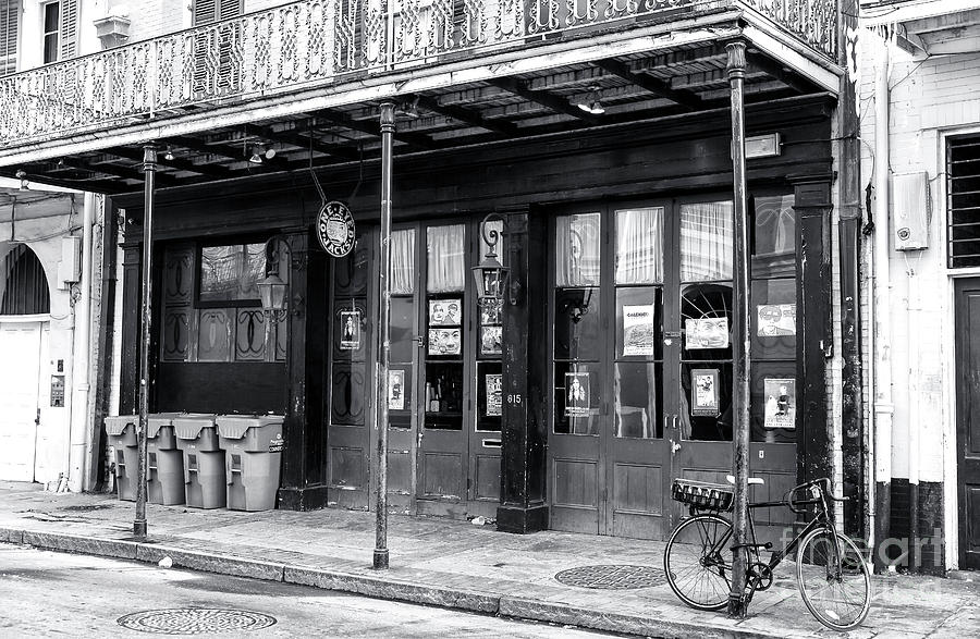 Bicycle on Toulouse Street New Orleans Photograph by John Rizzuto