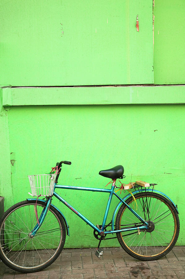 Bicycle Outside Cafe, Jingwei Jie Photograph by Walter Bibikow