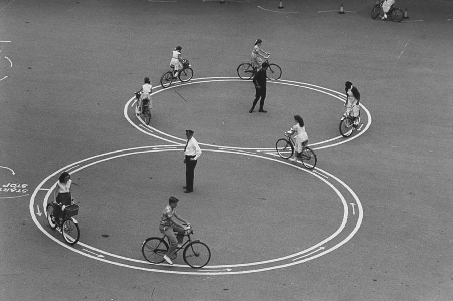 Black And White Photograph - Bicycle Safety Program by Yale Joel